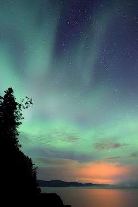 Northern Lights over Wauswaugoning Bay by Travis Novitsky